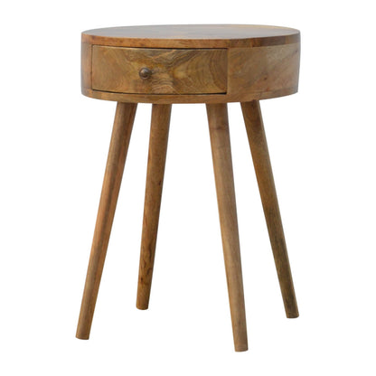 circular bedside table made from mango wood