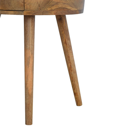 circular bedside table made from mango wood