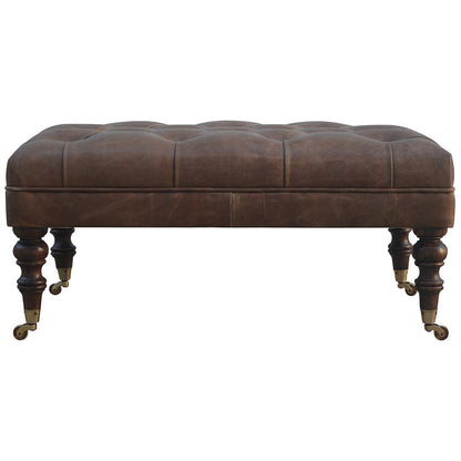 https://www.artisanfurniture.net/buffalo-leather-ottoman-with-castor-legs/