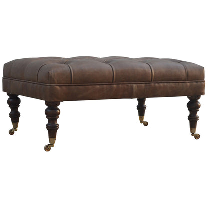 https://www.artisanfurniture.net/buffalo-leather-ottoman-with-castor-legs/