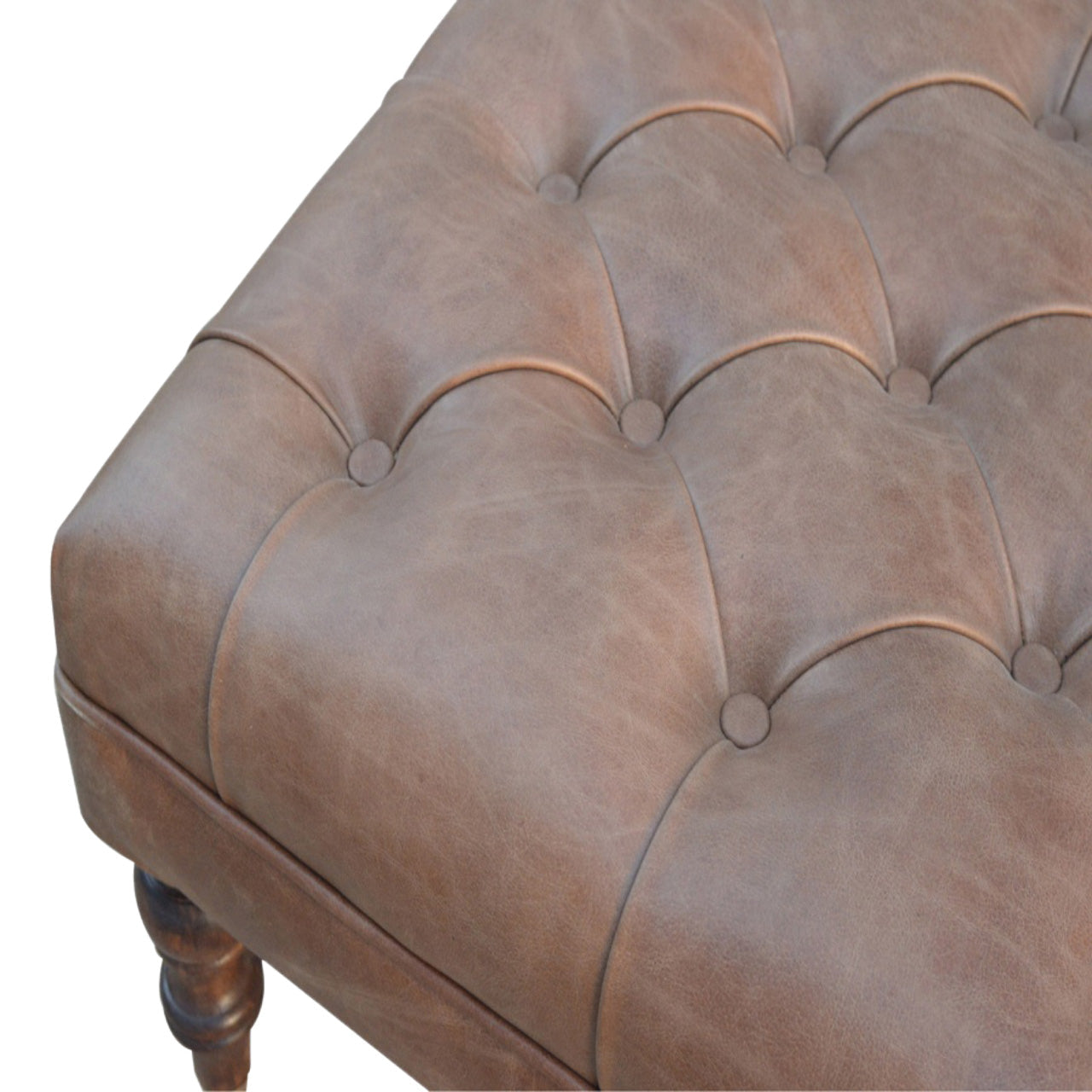 https://www.artisanfurniture.net/buffalo-leather-ottoman-with-castor-legs/